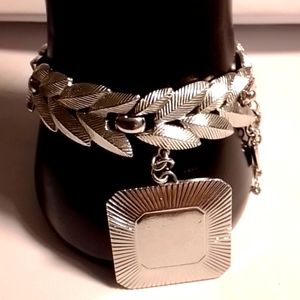 Monet silver tone leaf bracelet with dangle